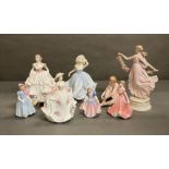 A selection of china figurines to include Wedgewood, Coalport and Royal Doulton