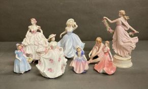 A selection of china figurines to include Wedgewood, Coalport and Royal Doulton