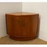 A teak Mid Century corner cupboard (H54cm D46cm)