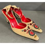 A pair of Fendi beaded sueded t-strap shoes, size 10