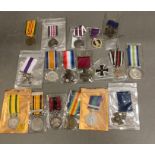 A selection of world military medals, replicas.