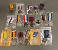 A selection of world military medals, replicas.