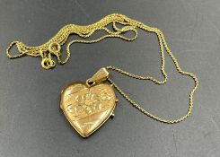 An 18ct gold locket on 18ct gold chain, marked 750 (Approximate Total weight 8.7g