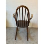 A Mid Century rocking chair stamped BSI 1960