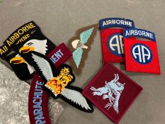 A selection of military Camo and Parachute regiment reproduction items