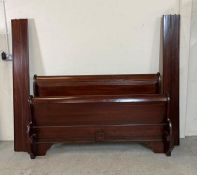 A mahogany sleigh bed with wooden slats and scrolling bed head and stead 5ft x 6ft