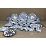 A selection of Wedgewood Jasperware to include Christmas plates, pin dishes and tankards