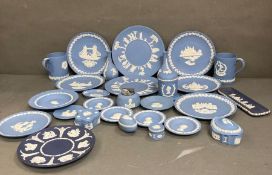 A selection of Wedgewood Jasperware to include Christmas plates, pin dishes and tankards