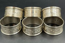 a set of six engraved silver napkin rings by Henry Griffith & Sons Ltd, hallmarked for Sheffield