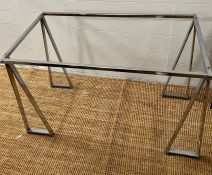 A chrome table frame with triangle shape legs (H70cm W102cm D55cm)