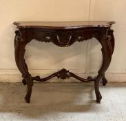 A Louis Phillipe style carved mahogany console table (H77cm W107cm D45cm)