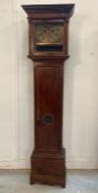 An oak eight day long case clock, the brass dial with a calendar AF