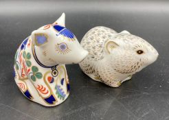 Two boxed Royal Crown Derby paperweights a mole and a pig, gold stoppers