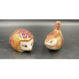 Two boxed Royal Crown Derby paperweights, Hedgehog and Wren, one gold stopper and one silver