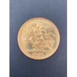A 1982 half sovereign coin.