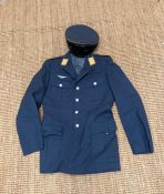 A German air force officers parade jacket with insignia and accompanying cap