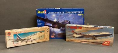 A selection of three aeroplane model kits to include Airfix and Revell