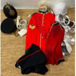 A selection of military uniforms, some items reproduction