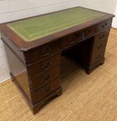 A mahogany pedestal desk with green leather top (H78cm W123cm)