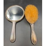 Hallmarked silver backed dressing table mirror and brush