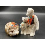 Two boxed Royal Crown Derby paperweights, Hedgehog and two teddy bears, one with gold stopper