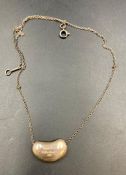 A Tiffany and Co Elsa Peretti coffee bean necklace marked 925 Approx weight 8g