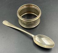 A hallmarked napkin ring and a silver teaspoon (Approximate Total Weight 25g)