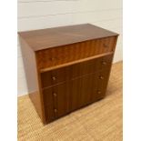 A Uniflex Mid Century chest of drawers with inlaid top drawer by Peter Haywood (H76cm W78cm D45cm)