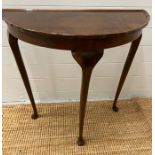 A demi lune side table (76cm x 37cm)