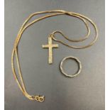 A 9ct gold cross and chain and a white gold 9ct ring, size L. Approximate Total Weight 10g