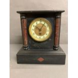 A French slate mantel clock with enamel face