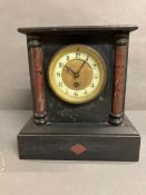A French slate mantel clock with enamel face