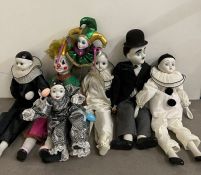 A collection of clowns and Pierrot clown with porcelain faces