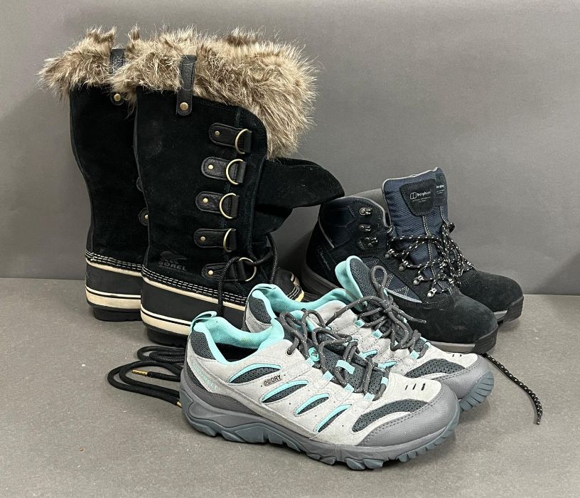 Three pairs of outdoor pursuits boots and shoes by Sorel, Berhaus and Merrell, sizes 8 and 8.5