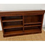 A mahogany double open bookcase stand upon a plinth base (H92cm W52cm D35cm)