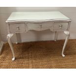 A white painted dressing table with three drawers and cabriole legs (H75cm W98cm D51cm)