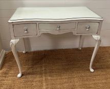 A white painted dressing table with three drawers and cabriole legs (H75cm W98cm D51cm)