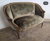 An 19th century gilt canape upholstered in green (H90cm W138cm D72cm SH42cm)