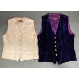 Two vintage Liberty waistcoats. One pale pink damask and one in a crushed velvet with gold button