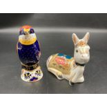 Two boxed Royal Crown Derby paperweights, Bee Eater and Donkey Foal, both with gold stoppers