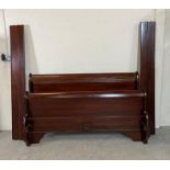 A mahogany sleigh bed with wooden slats and scrolling bed head and stead 5ft x 6ft