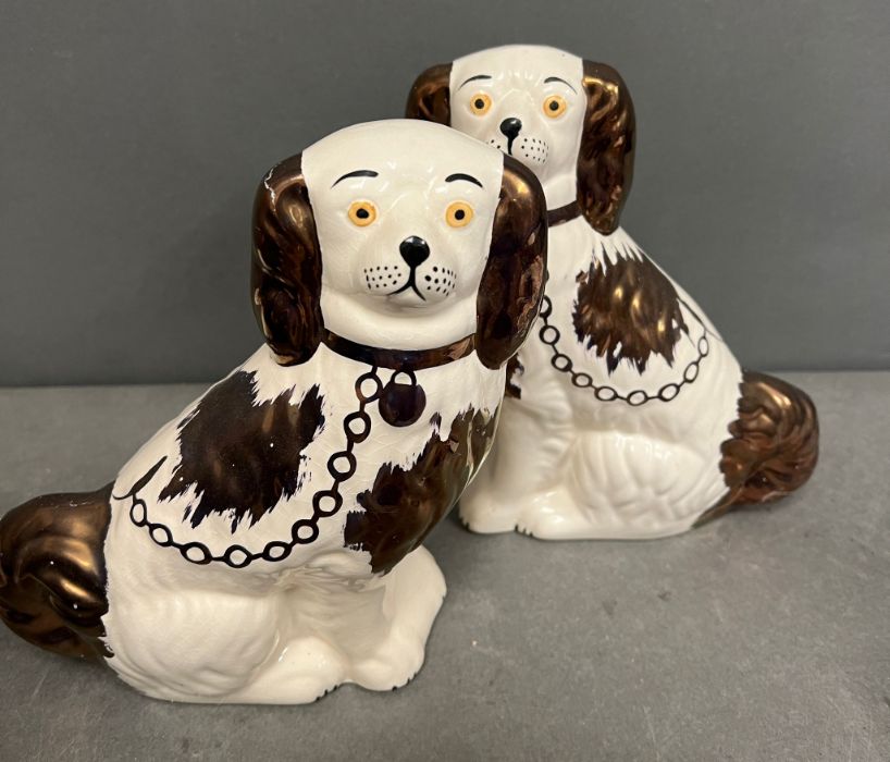 A pair of Staffordshire dogs