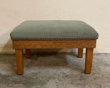 A Mid Century green upholstered foot stool with storage