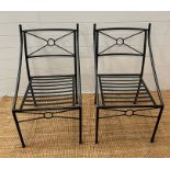 Two wrought iron garden chairs