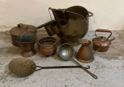 A selection of copper and brass items to include a coal scuttle, teapot and a chestnut roaster