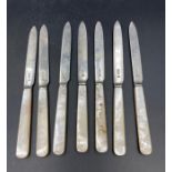 A set of seven mother of pearl handled silver fruit knives by Mappin & Webb, hallmarked for