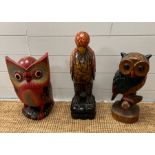 Three wooden owls