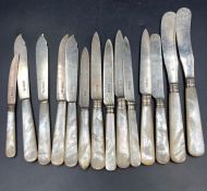 A Harlequin set of silver knives with mother of pearl handles, various makers and hallmarks