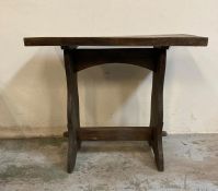 A vintage hall table with cross stretcher on splayed feet