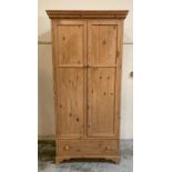 A two door pine wardrobe with drawer under (H200cm W95cm D66cm)
